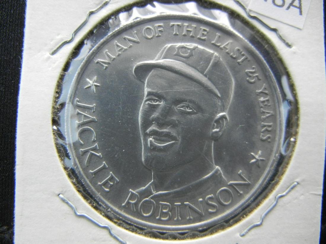 Jackie Robinson.  Dodgers #42. (1 of 3)