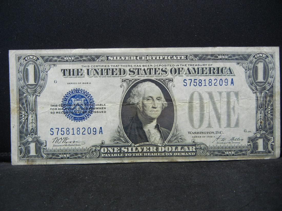 1928-A $1 "Funny Back" Silver Certificate.  Serial # (1 of 3)