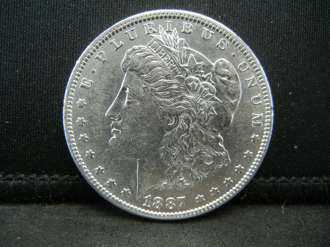 1887 O Morgan Dollar CH BU Better date (1 of 2)