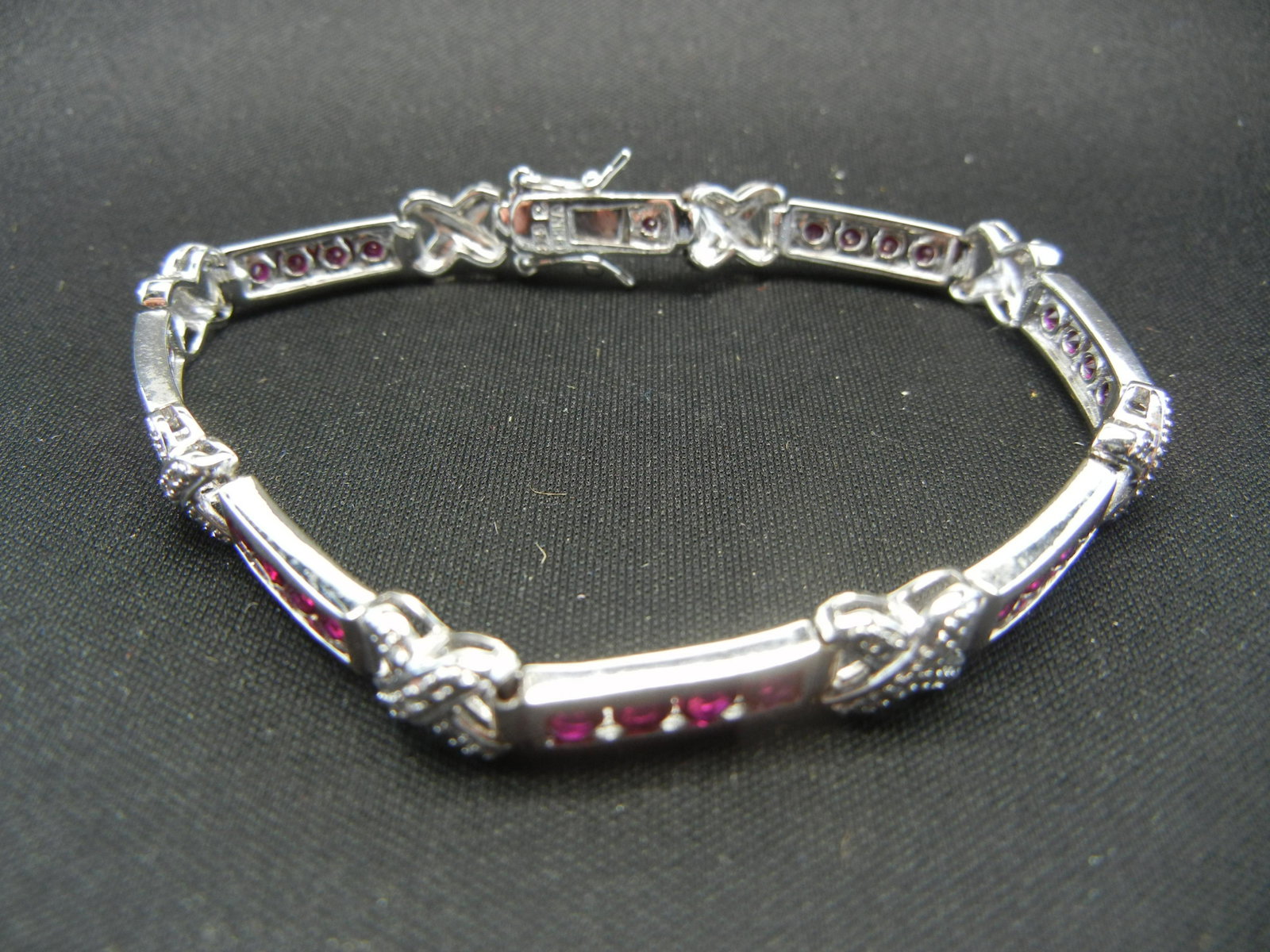 7 Inch Sterling Bracelet. Attractive with red stones.: 7 Inch Sterling Bracelet. Attractive with red stones.