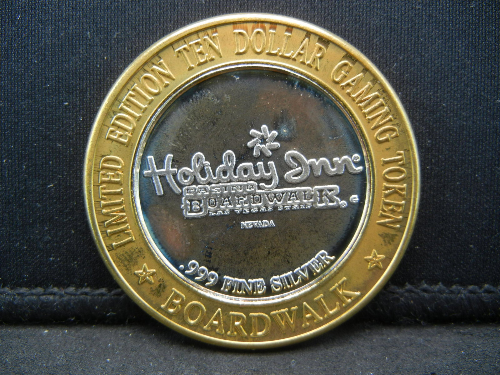 $10 .999 Fine Silver Holiday Inn Casino Gaming Token: $10 .999 Fine Silver Holiday Inn Casino Gaming Token Las Vegas, NV.