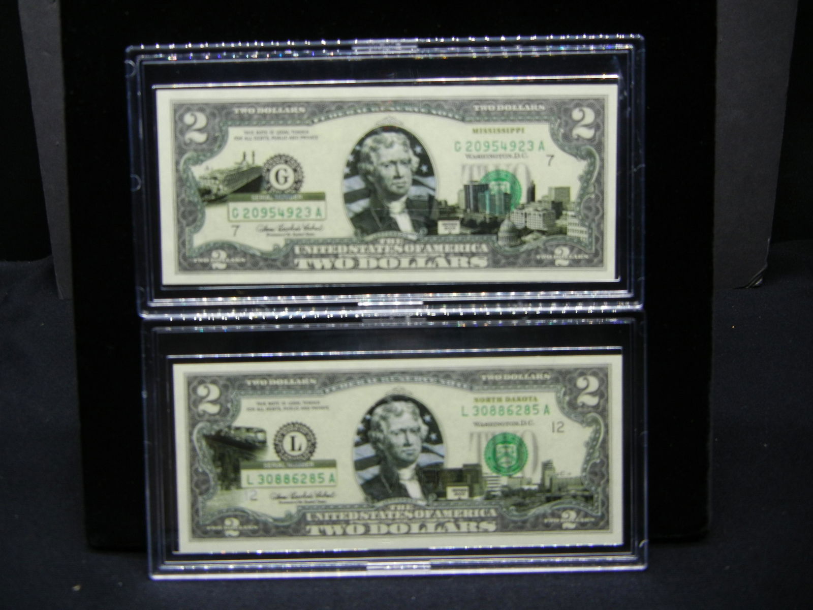 (2) Series 2003A $2 Bills modified to show scenes from (1 of 7)