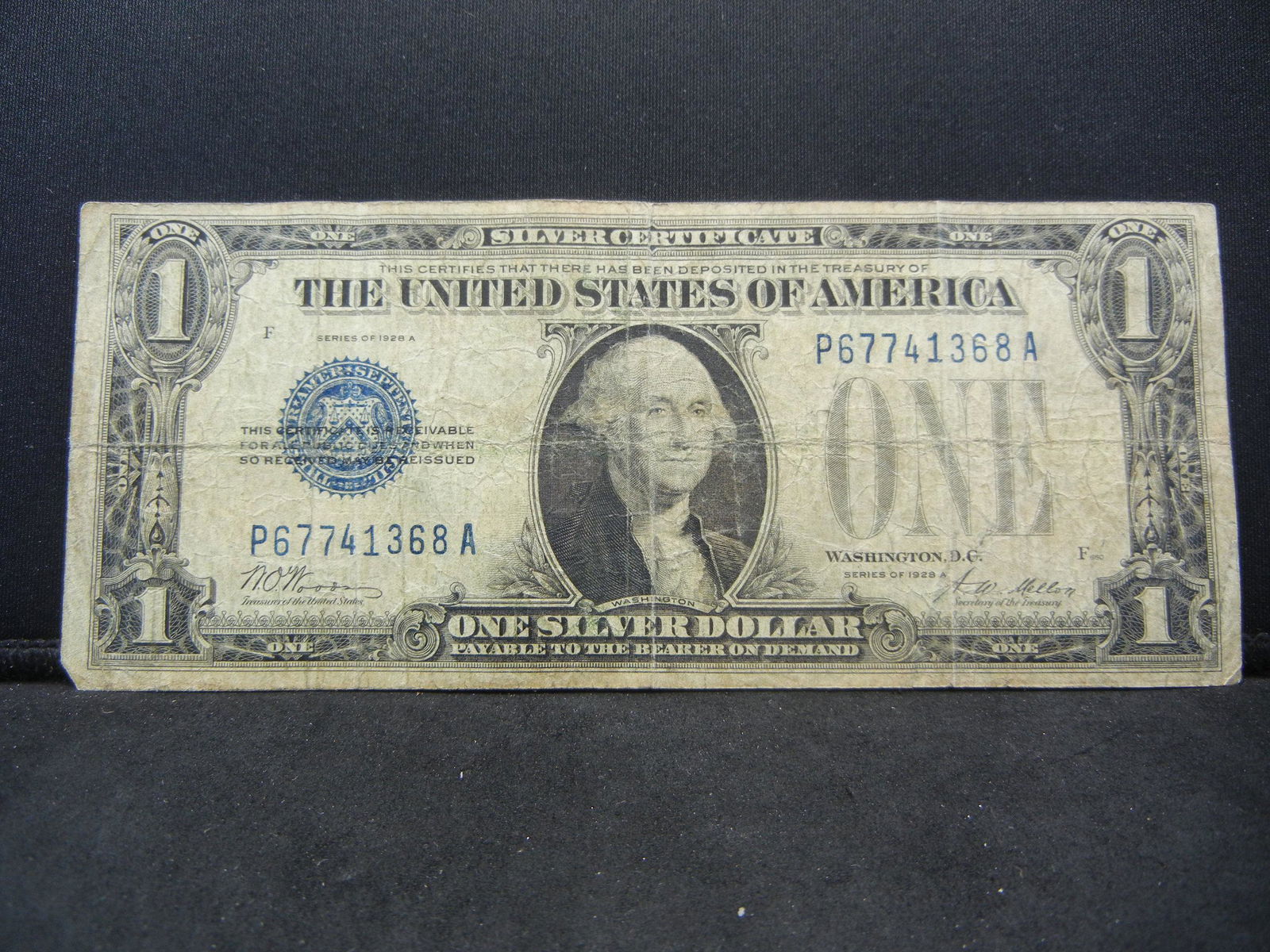 1928-A $1 "Funny Back" Silver Certificate.  Serial # (1 of 3)