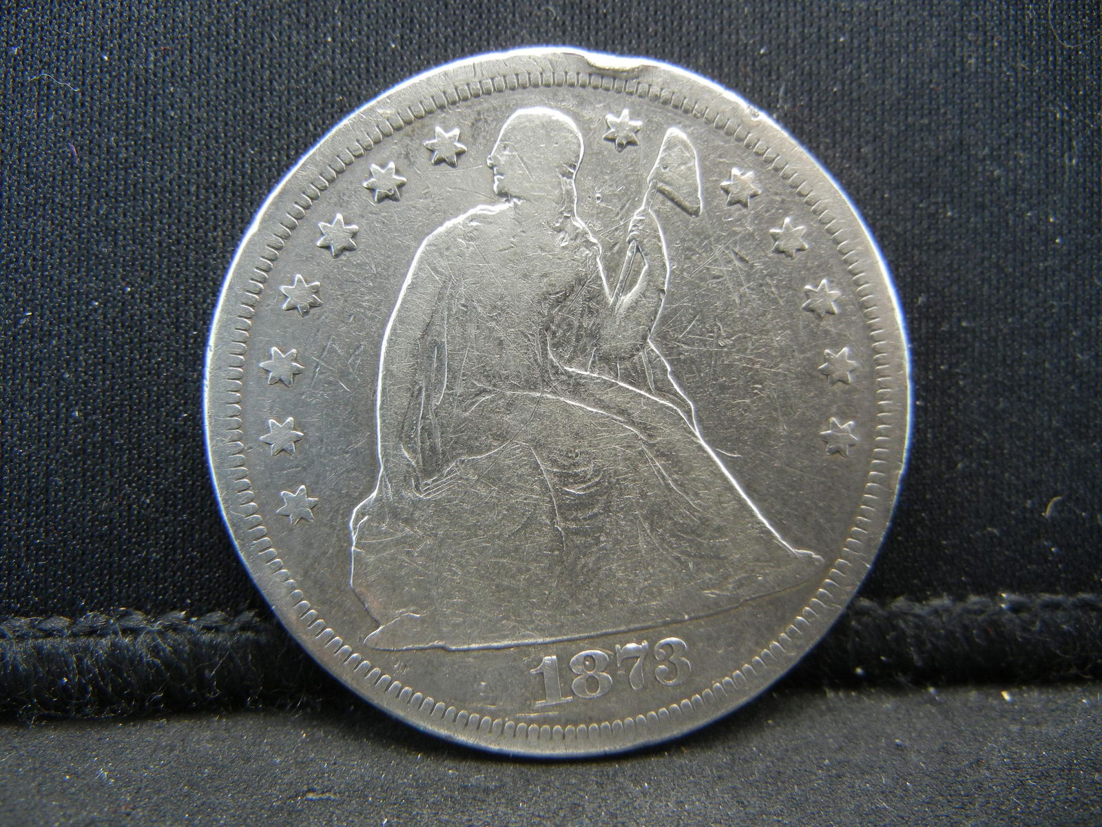 1873 Seated Dollar (1 of 2)
