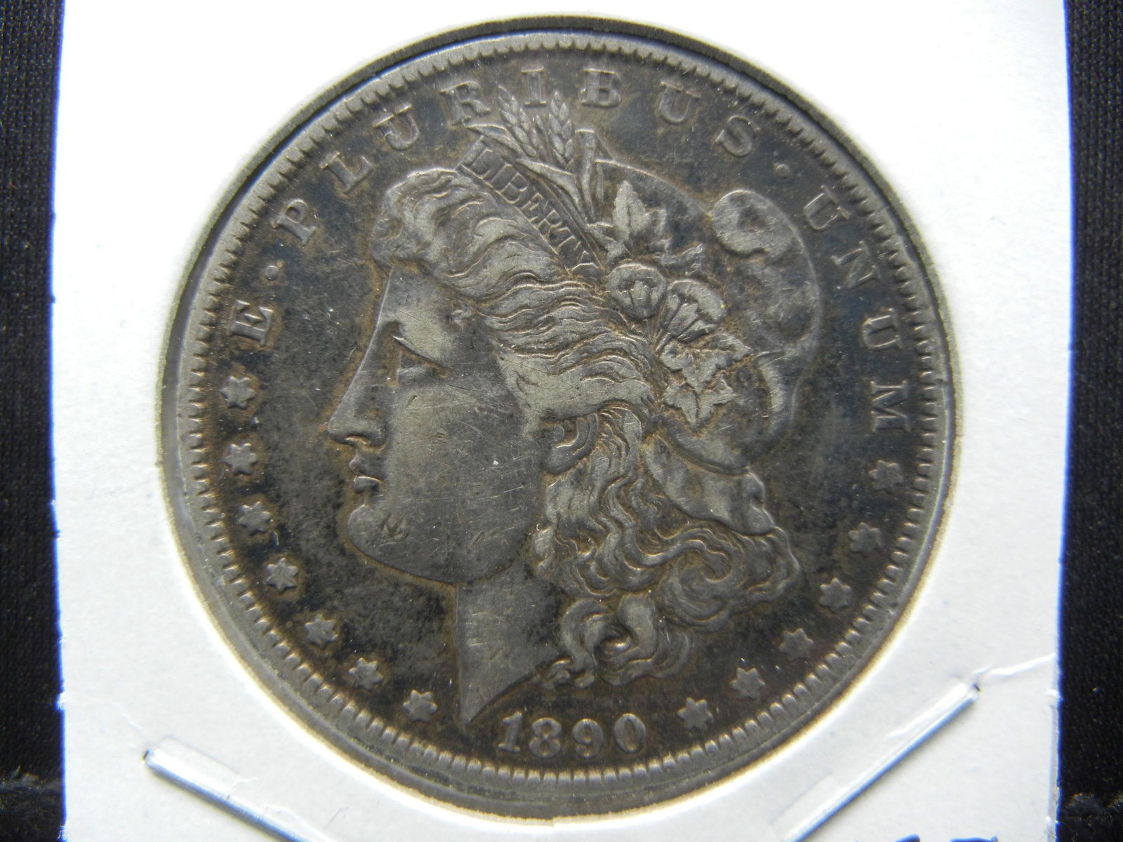 1890 Morgan Dollar. Nice color. XF/AU (1 of 3)
