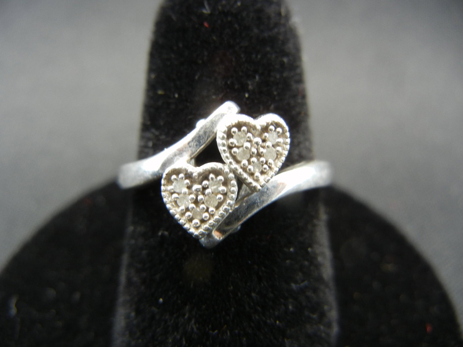 Ladies sterling band size 7 with two marcasite hearts.: Ladies sterling band size 7 with two marcasite hearts.
