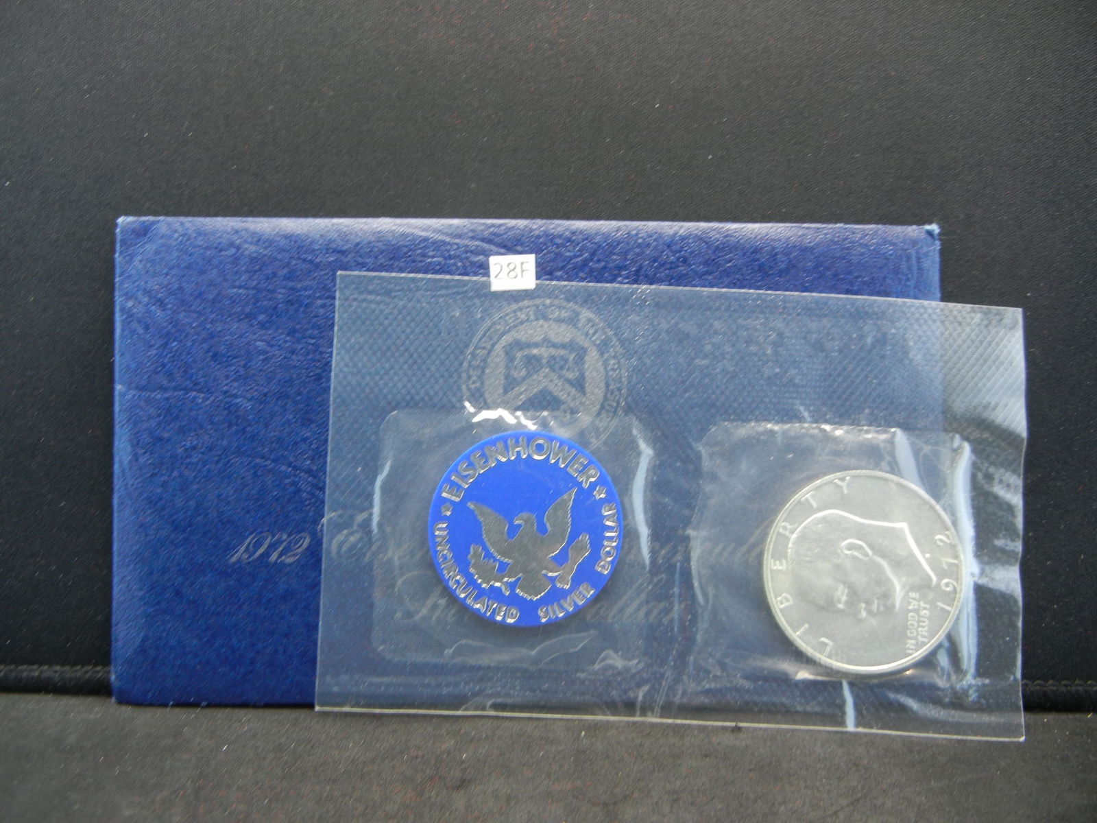 1972 EISENHOWERUNCIRCULATED 40% SILVER DOLLAR IN BLUE (1 of 3)