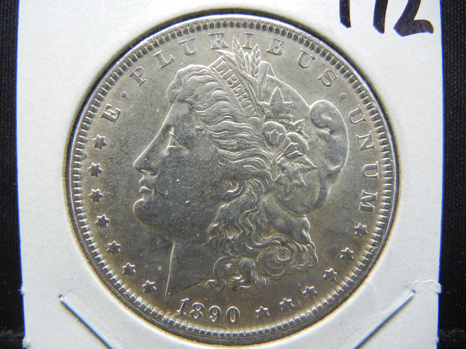 1890 Morgan Dollar. High UNC (1 of 3)