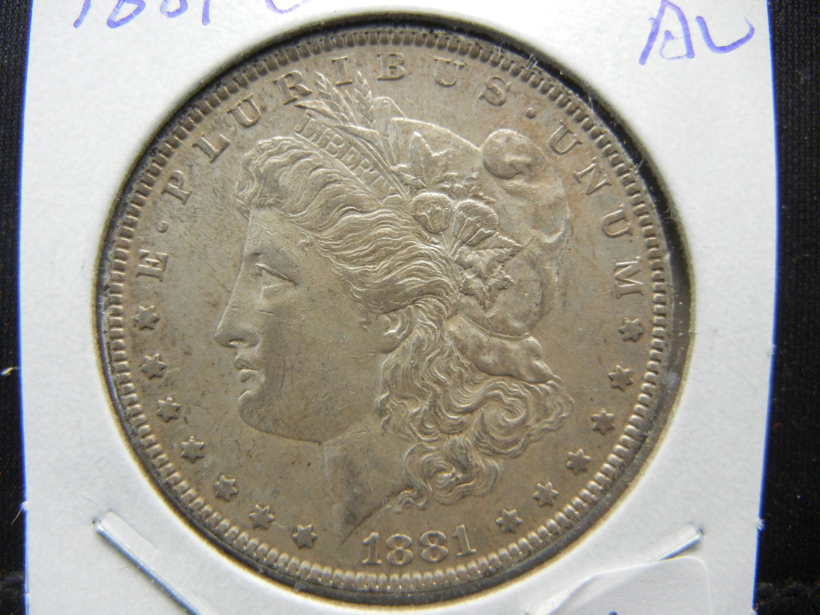1881-O Morgan Dollar.  Nice Almost Uncirculated. (1 of 3)