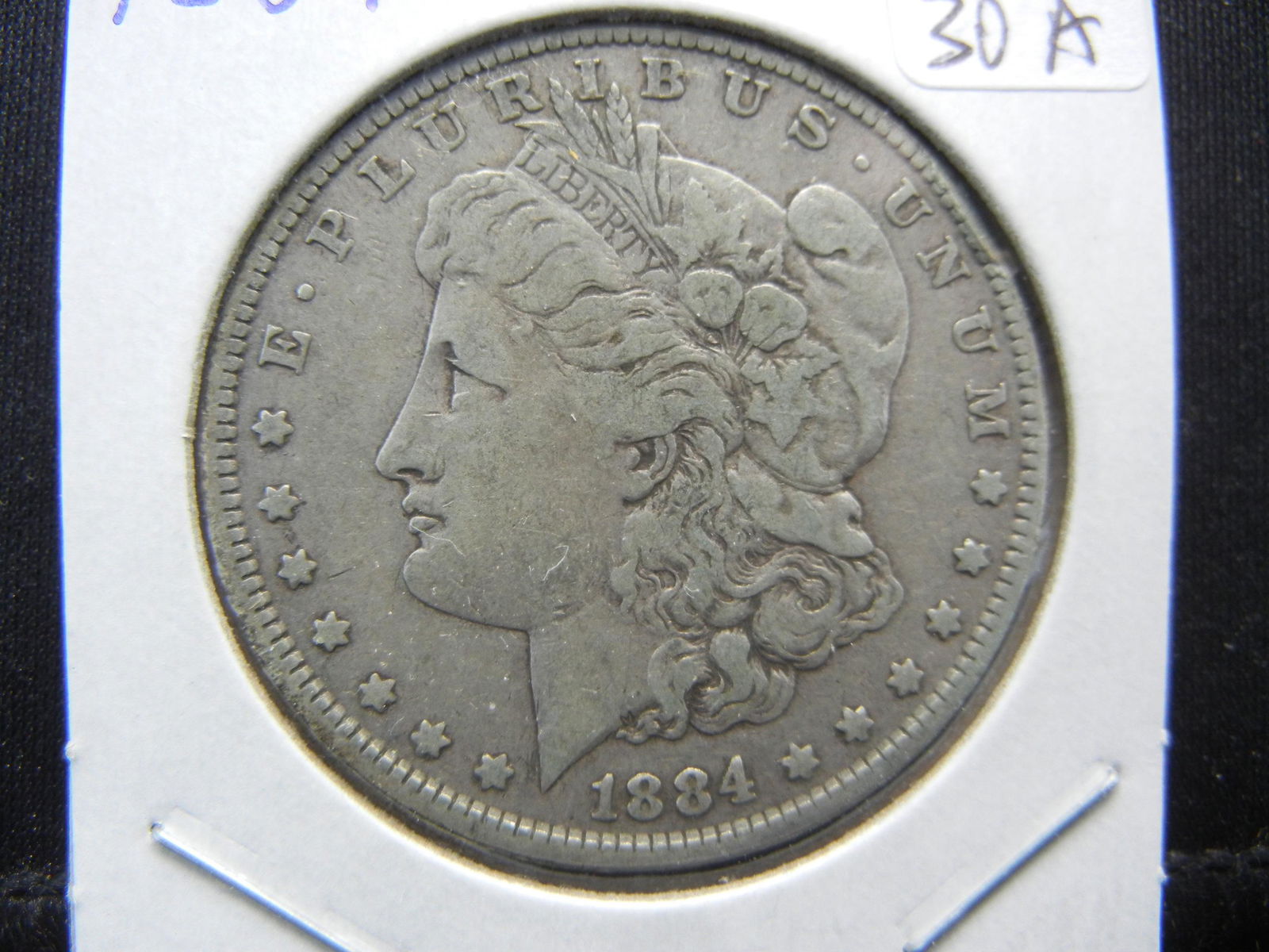 1884 Morgan Dollar.   Nice Very Fine. (1 of 3)