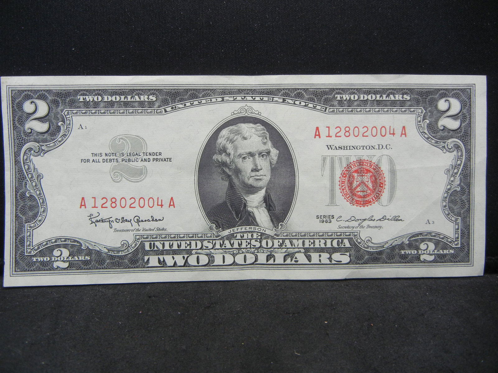 1963 $2 Red Seal United States Note. Serial # (1 of 3)