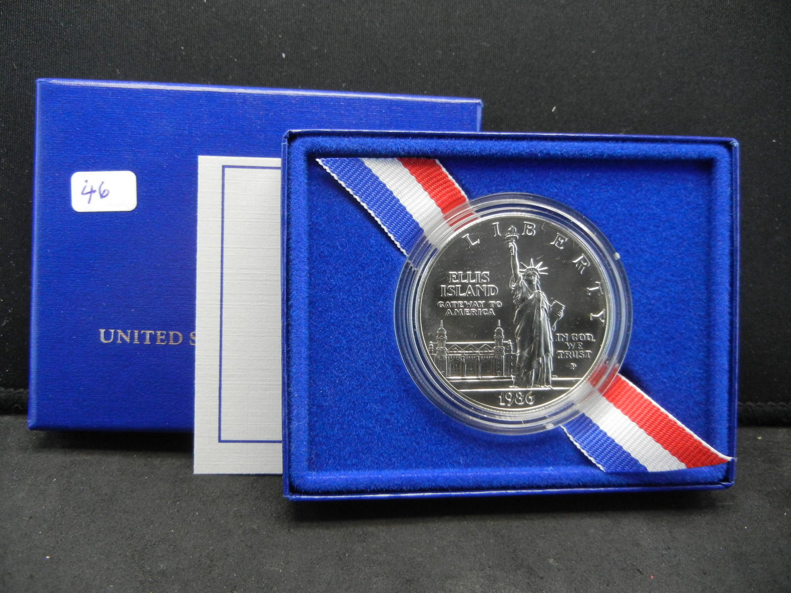 1986-D Statue of Liberty Silver Dollar in original box: 1986-D Statue of Liberty Silver Dollar in original box with COA GEM BU
