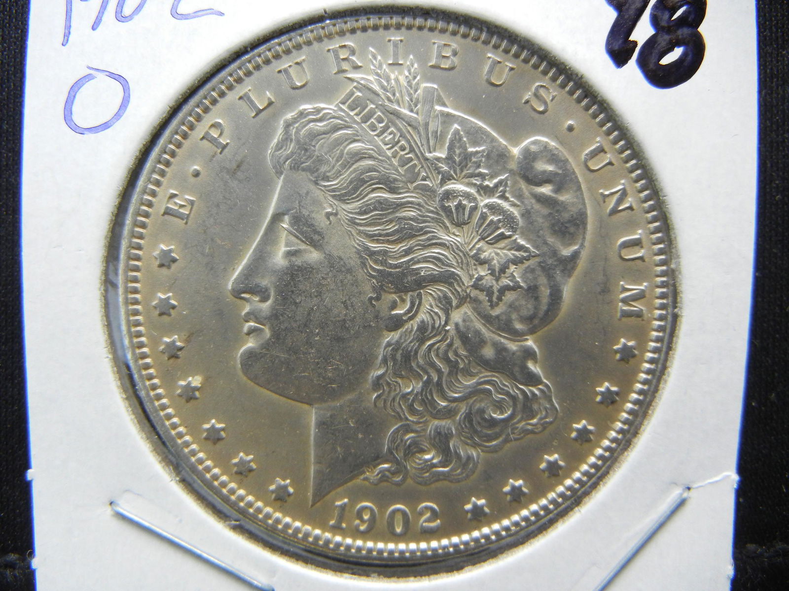 1902-O Morgan Dollar. MS64 (1 of 3)