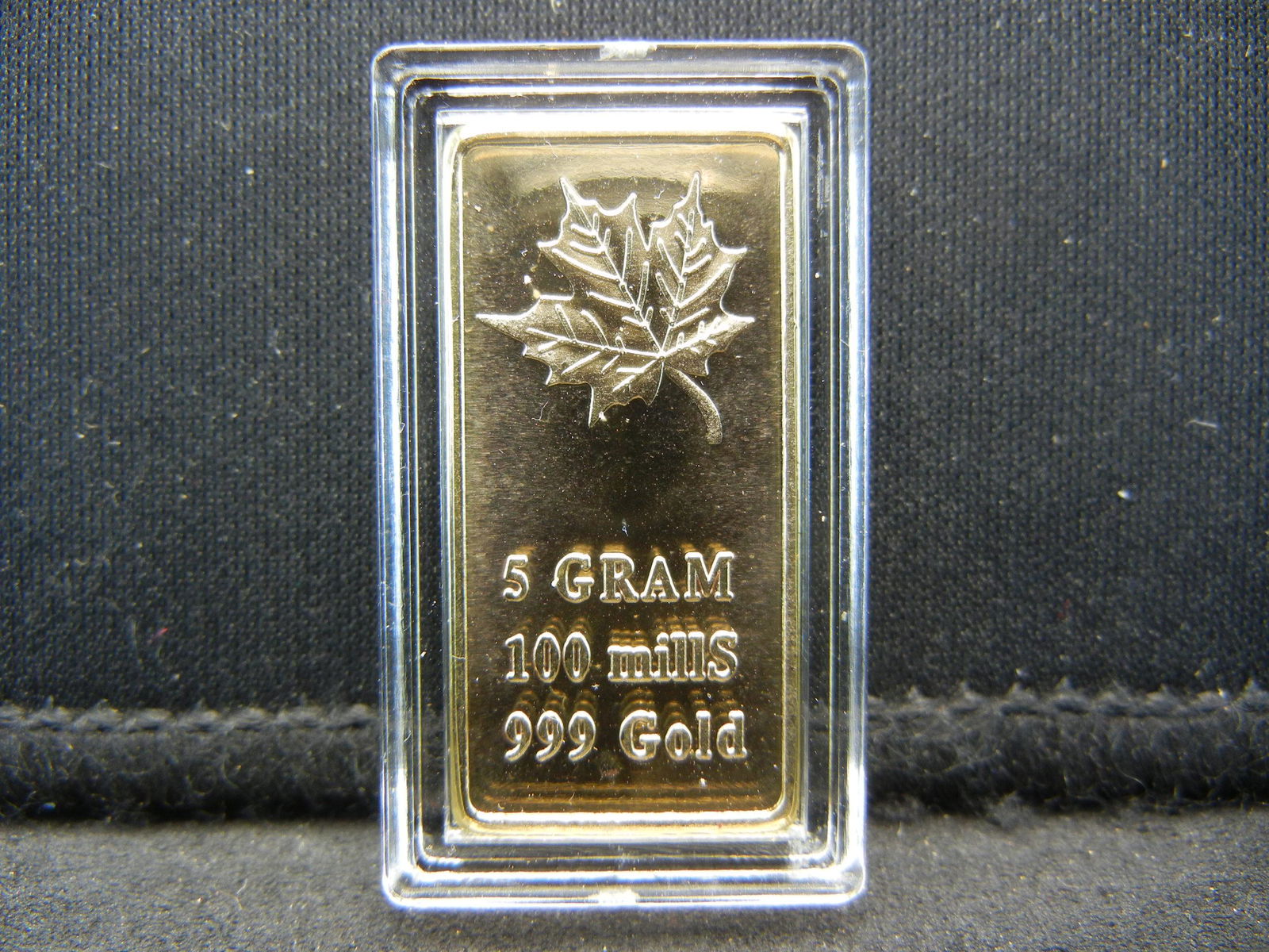 Clad 5 One Gram 100 Mills .999  Gold Maple Leaf (1 of 2)