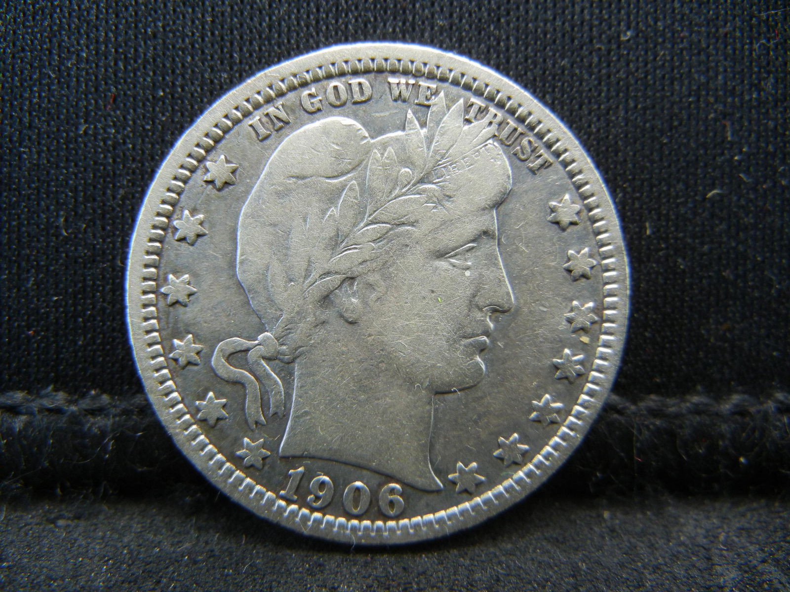 1906-O Barber Quarter, Bold "LIBERTY", F+. (1 of 2)