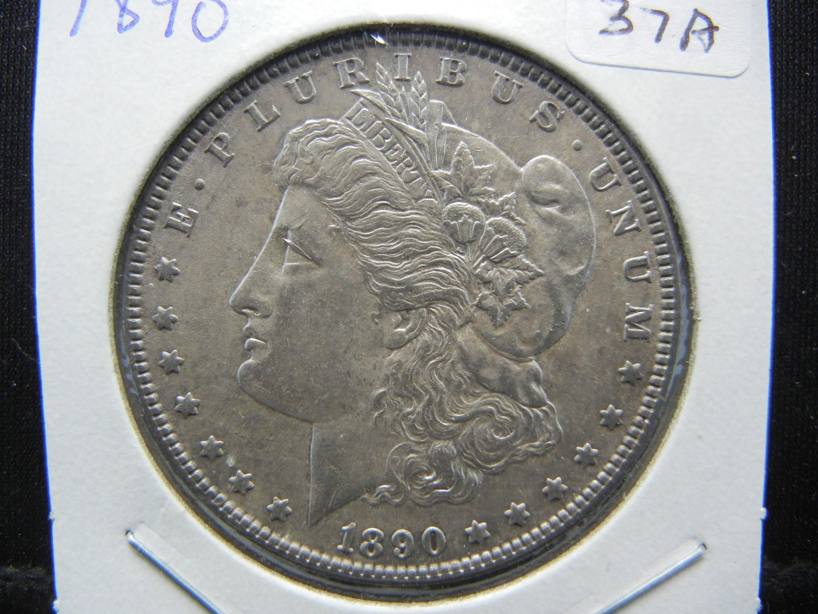 1890 Morgan Dollar.  Uncirculated (1 of 3)