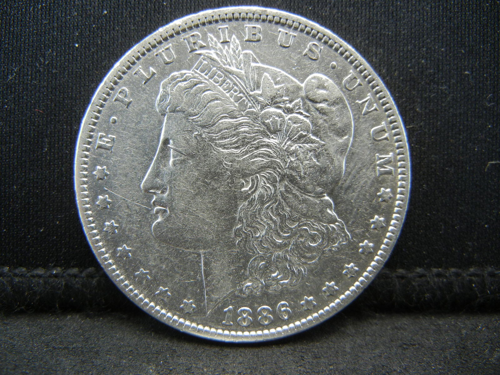 1886 O Morgan Dollar Higher Grade (1 of 2)