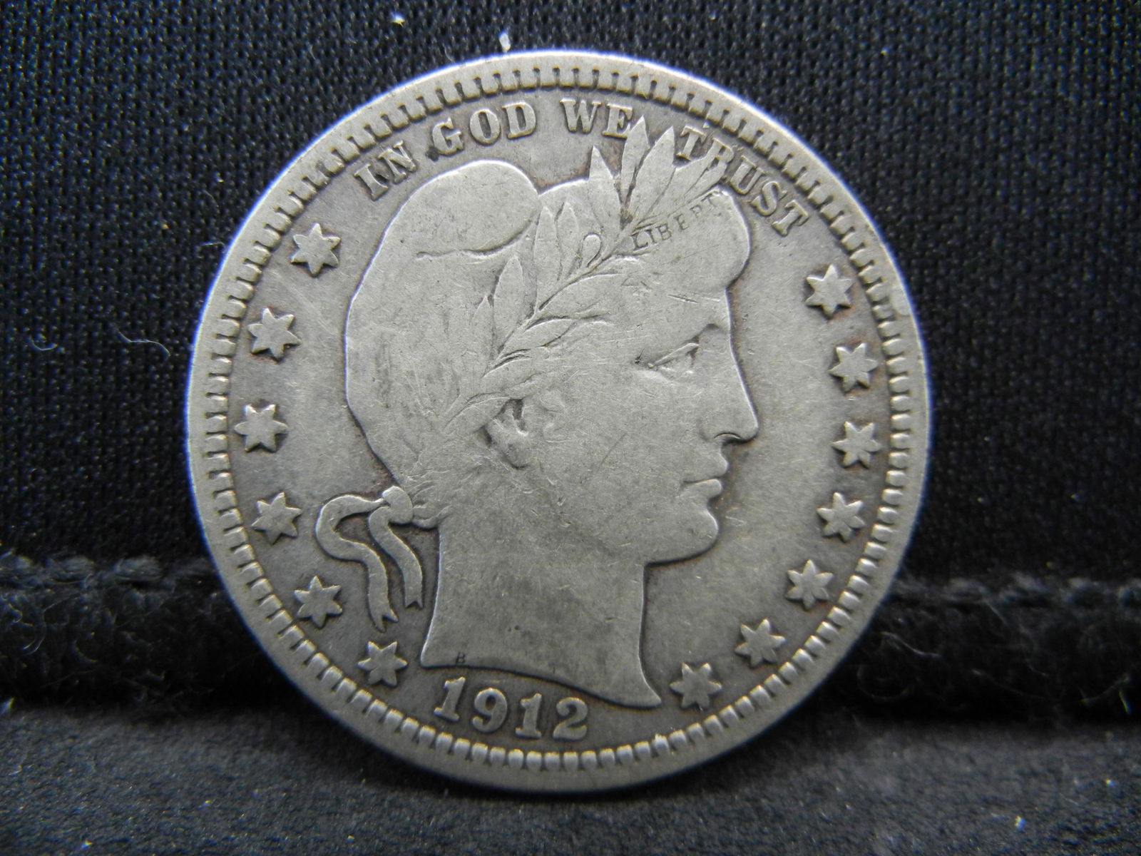 1912 Barber Quarter, Bold "LIBERTY", F+. (1 of 2)