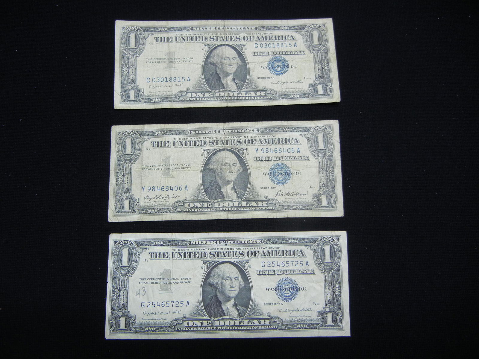 3 1957 $1 Silver Certificates (1 of 5)