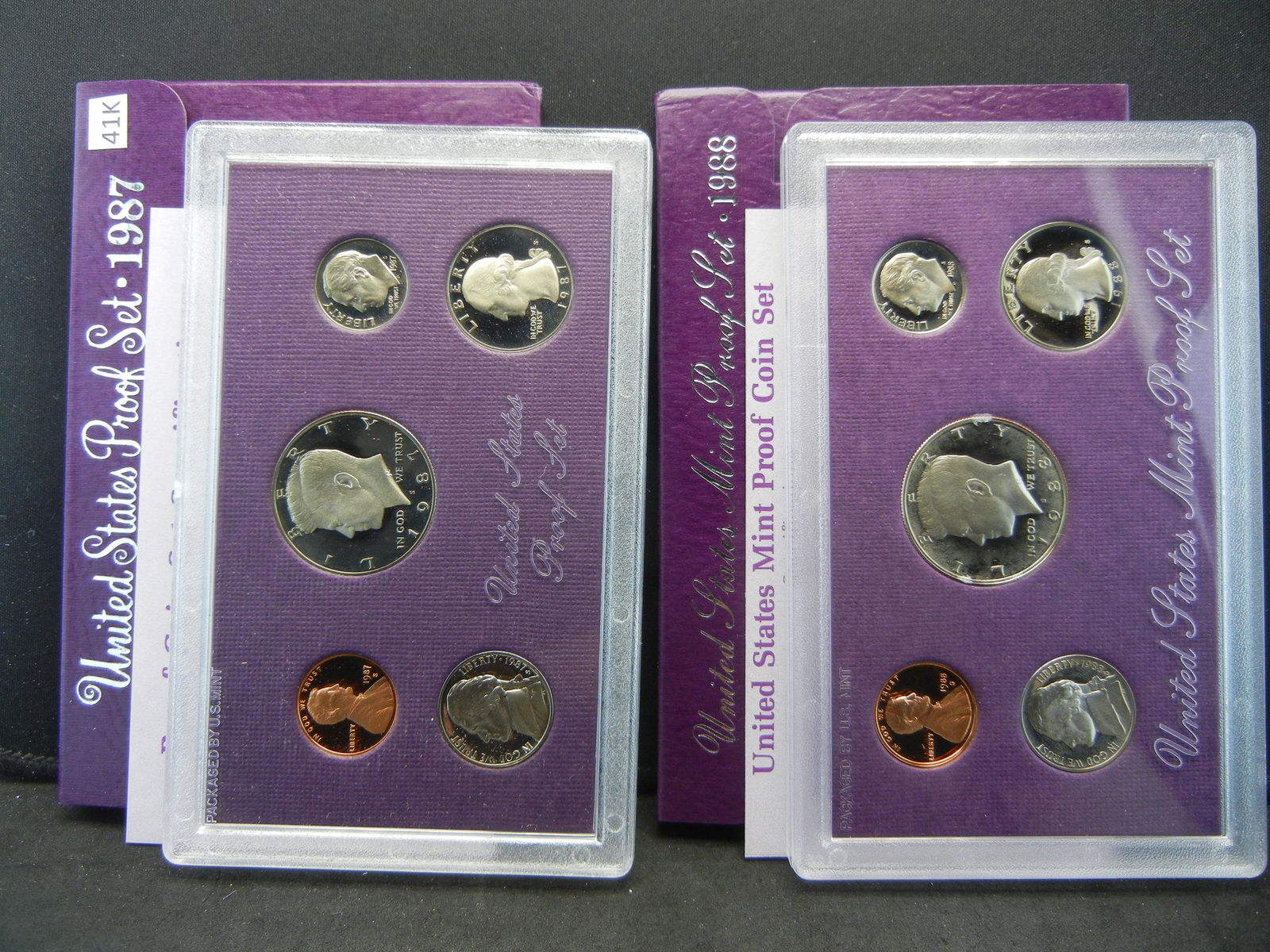 1987 & 1988 United States Mint 5 Coin Proof Sets With: 1987 & 1988 United States Mint 5 Coin Proof Sets With Original Gov't Packaging & COA's.