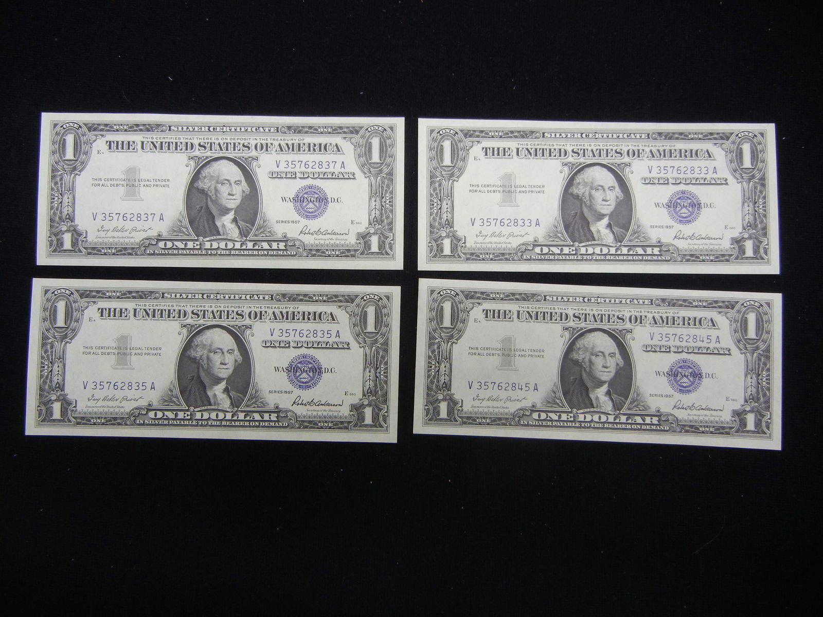 (4) 1957 One Dollar Silver Certificates, Uncirculated (1 of 5)