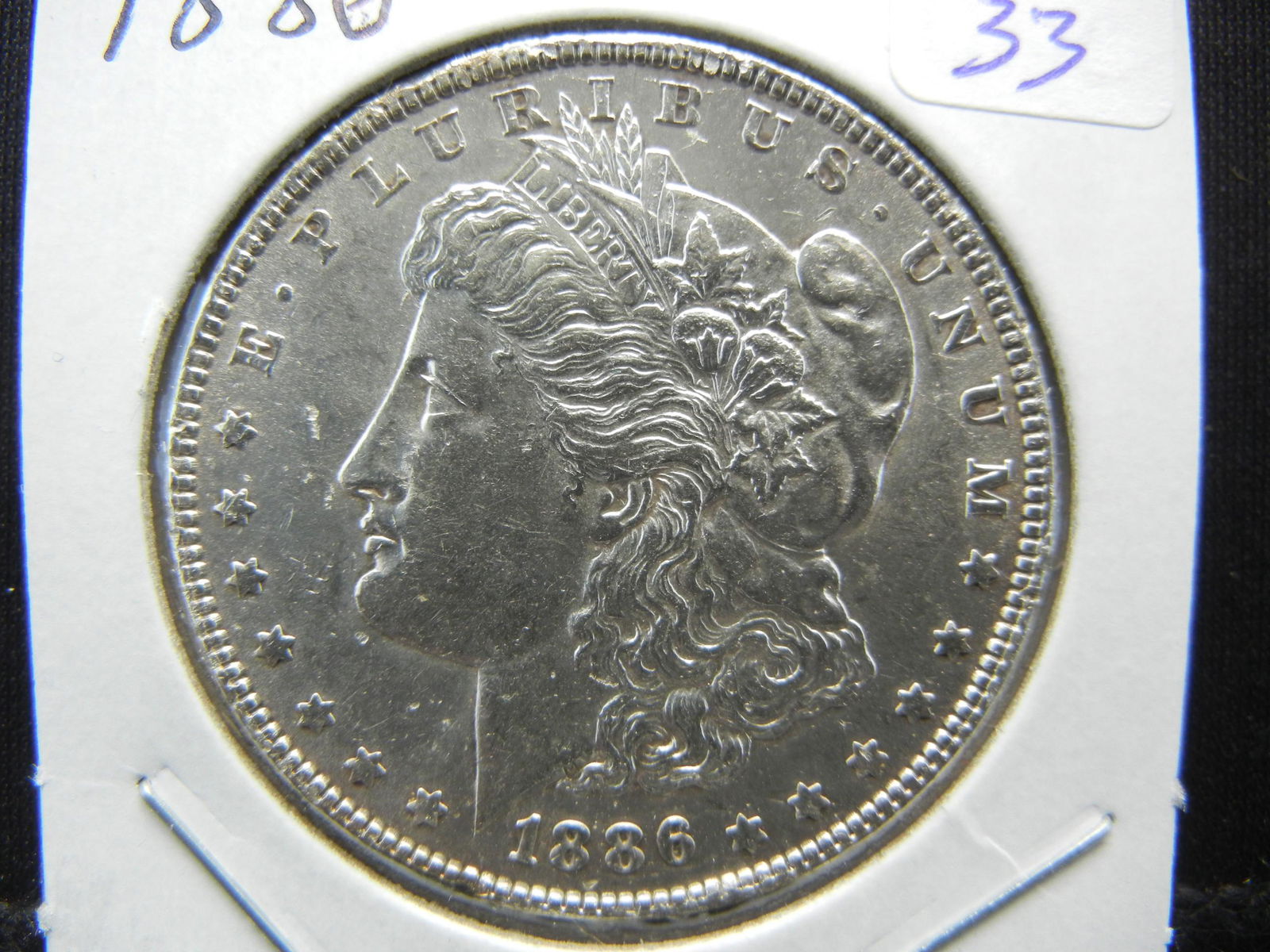 1886 Morgan Dollar.  Brilliant Uncirculated. (1 of 3)