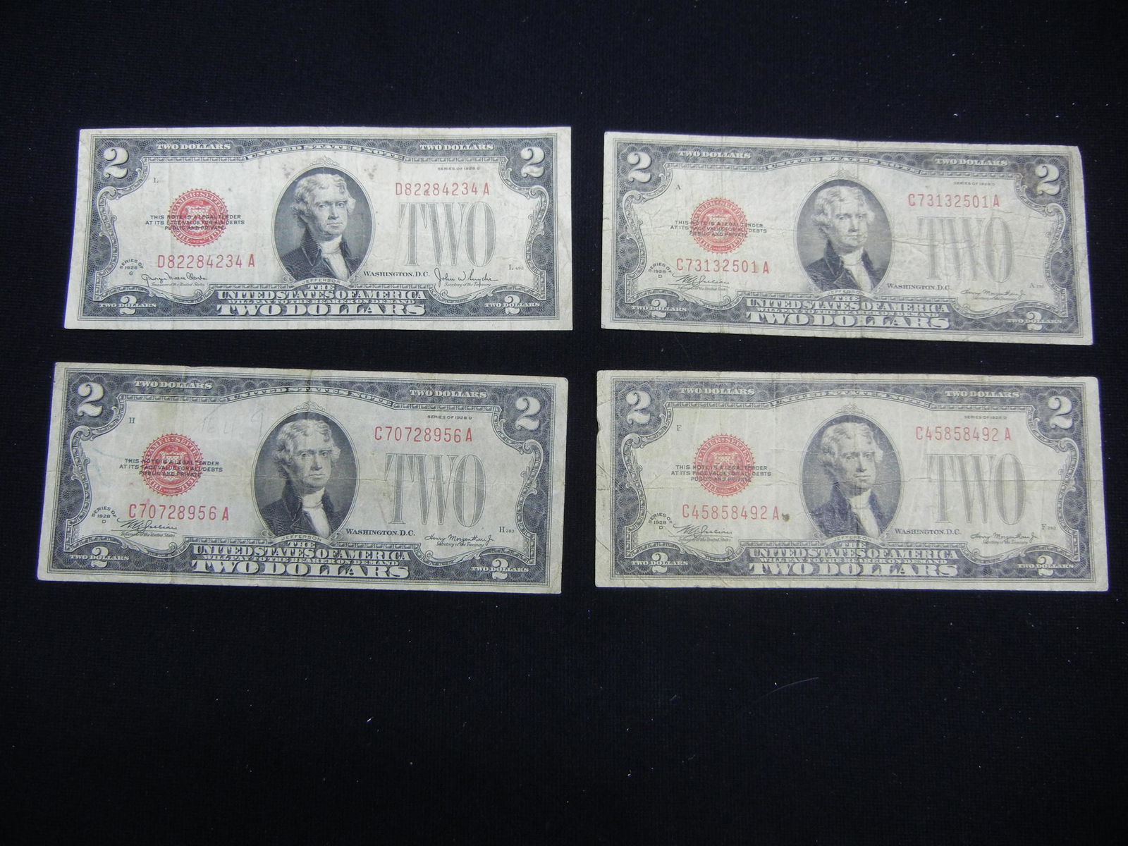 4 - 1928 Red Seal $2 Notes. (1 of 5)