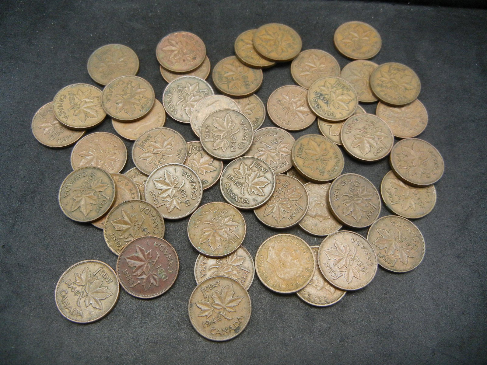Lot of 50 George VI Canadian Cents Dated 1937-1952.: Lot of 50 George VI Canadian Cents Dated 1937-1952.