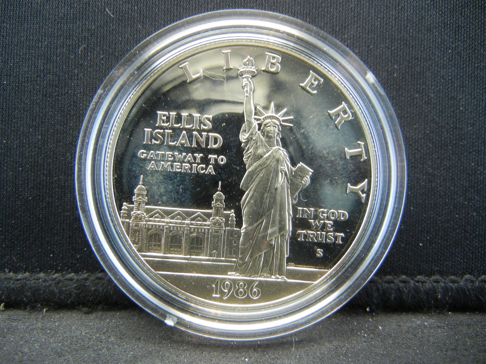 1986-S United States Mint Ellis Island Statue of: 1986-S United States Mint Ellis Island Statue of Liberty Proof Commemorative 90% Silver Dollar.