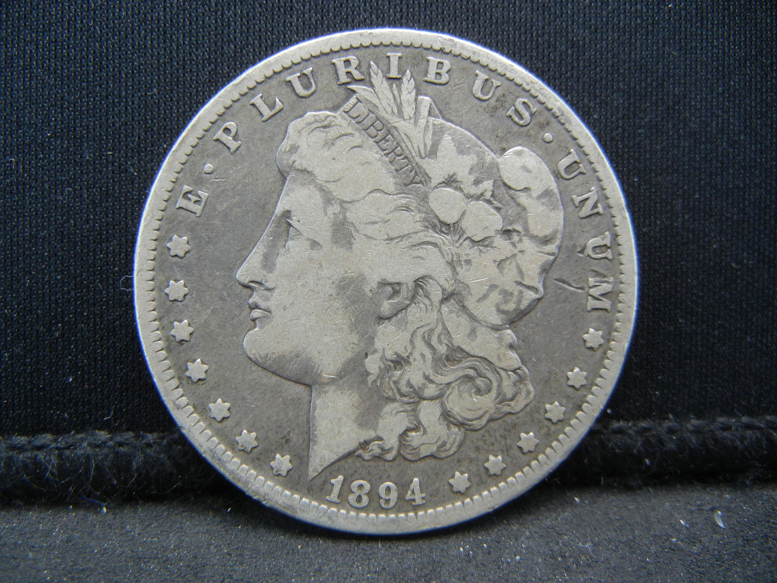 1894-O Semi-Key Date Morgan Silver Dollar. (1 of 2)