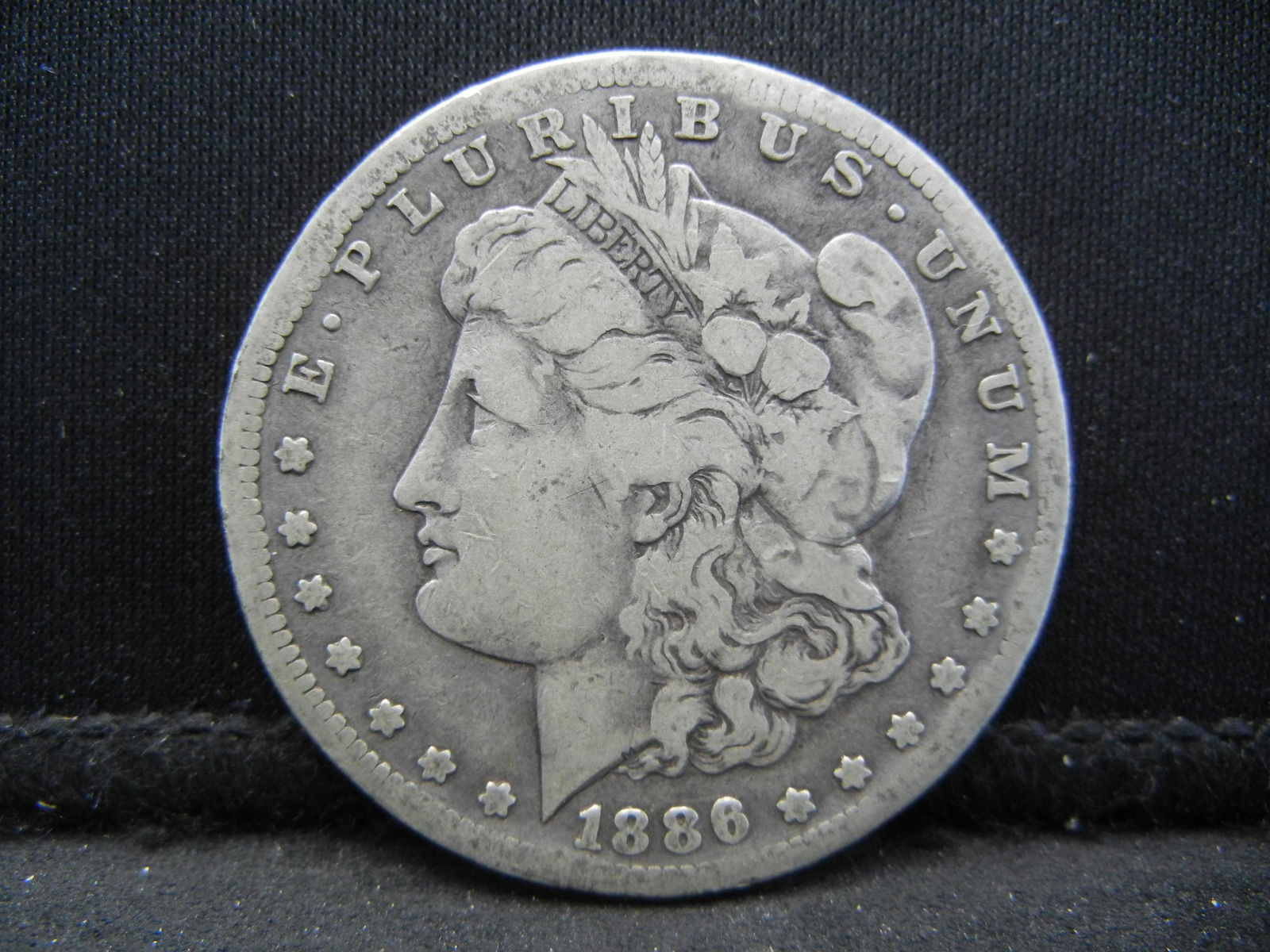 1886-S Semi-Key Date Morgan Silver Dollar. (1 of 2)