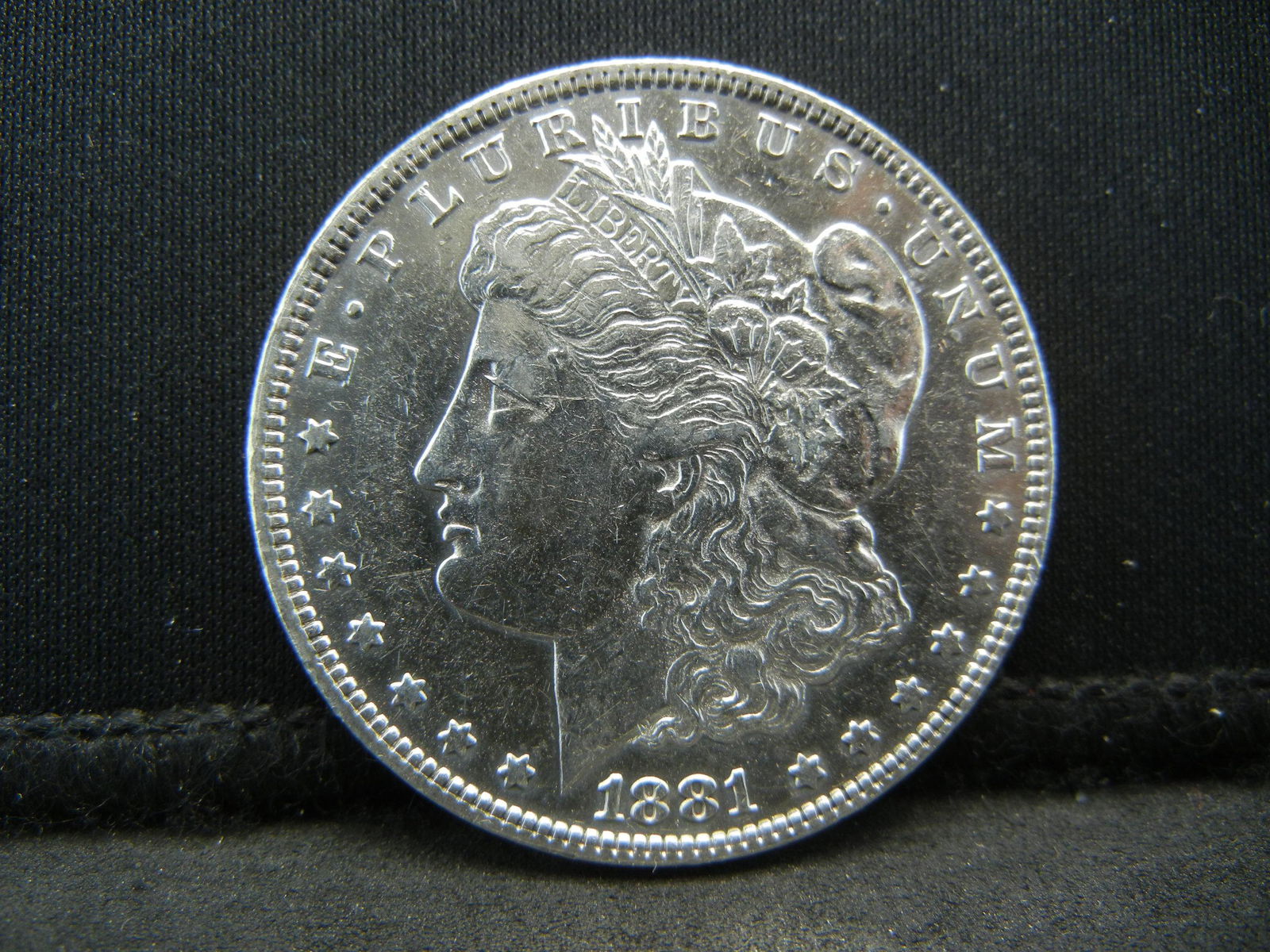1881-0 SILVER (90%) MORGAN DOLLAR, UNC (1 of 2)