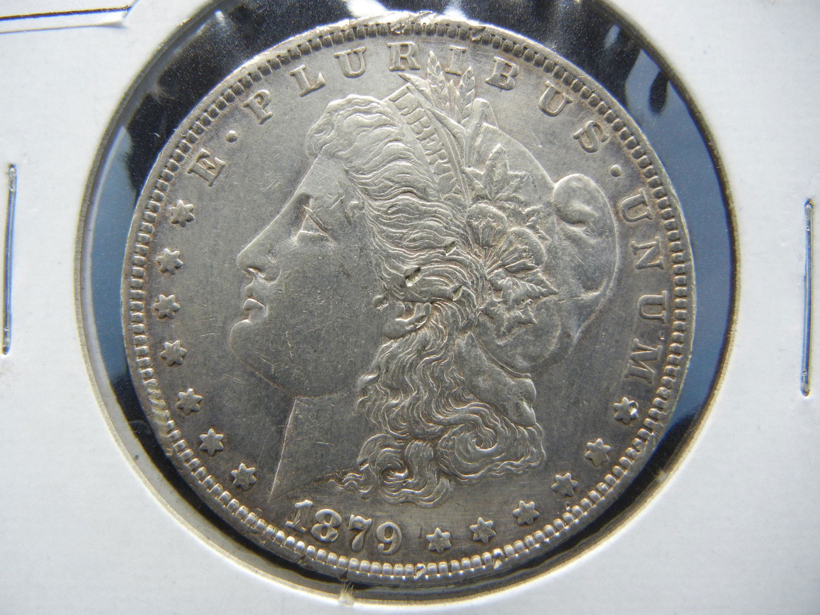 1879-O United States Morgan Silver Dollar AU (1 of 3)