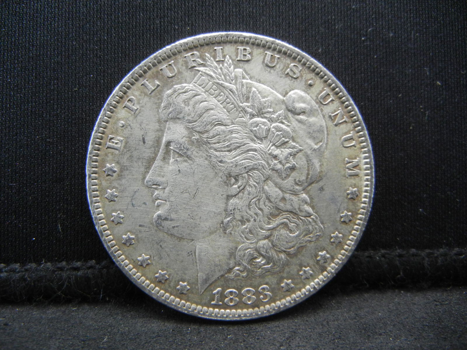 1883 O Morgan Dollar Higher Grade (1 of 2)