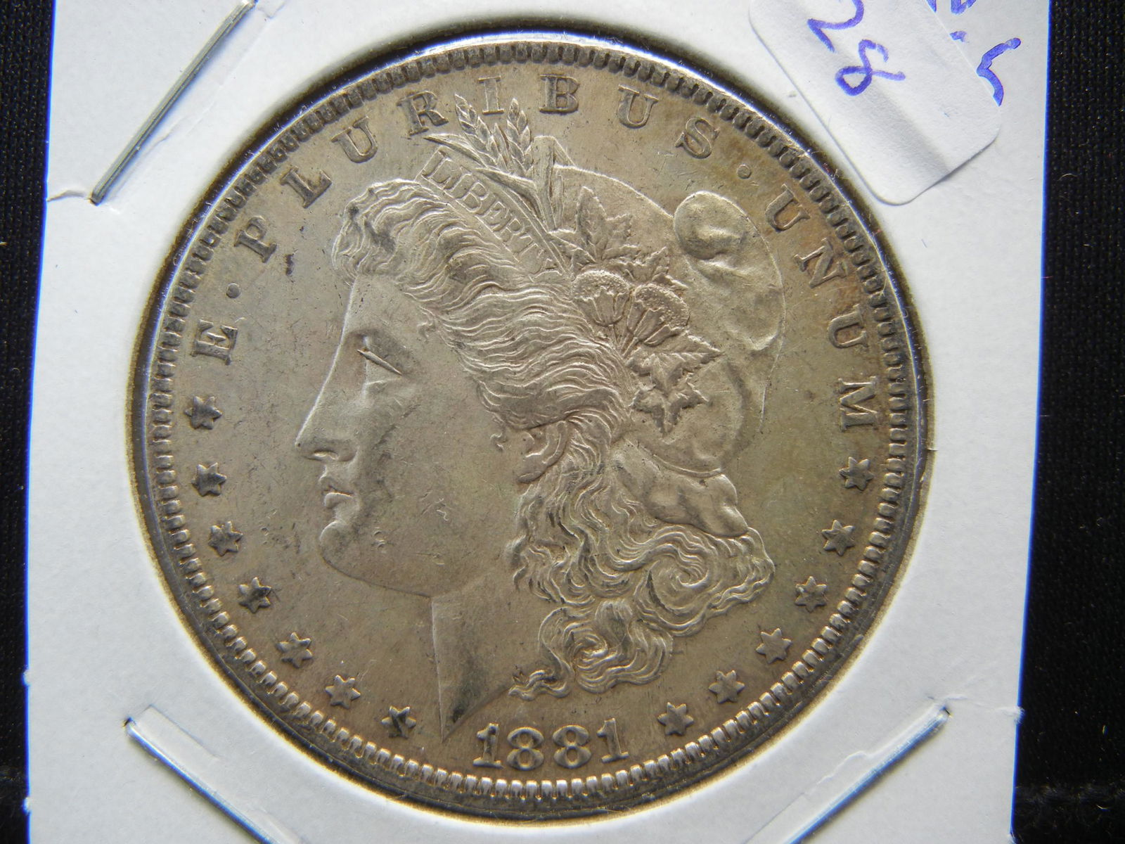1881-O Morgan Dollar.  Almost Uncirculated 55. (1 of 3)