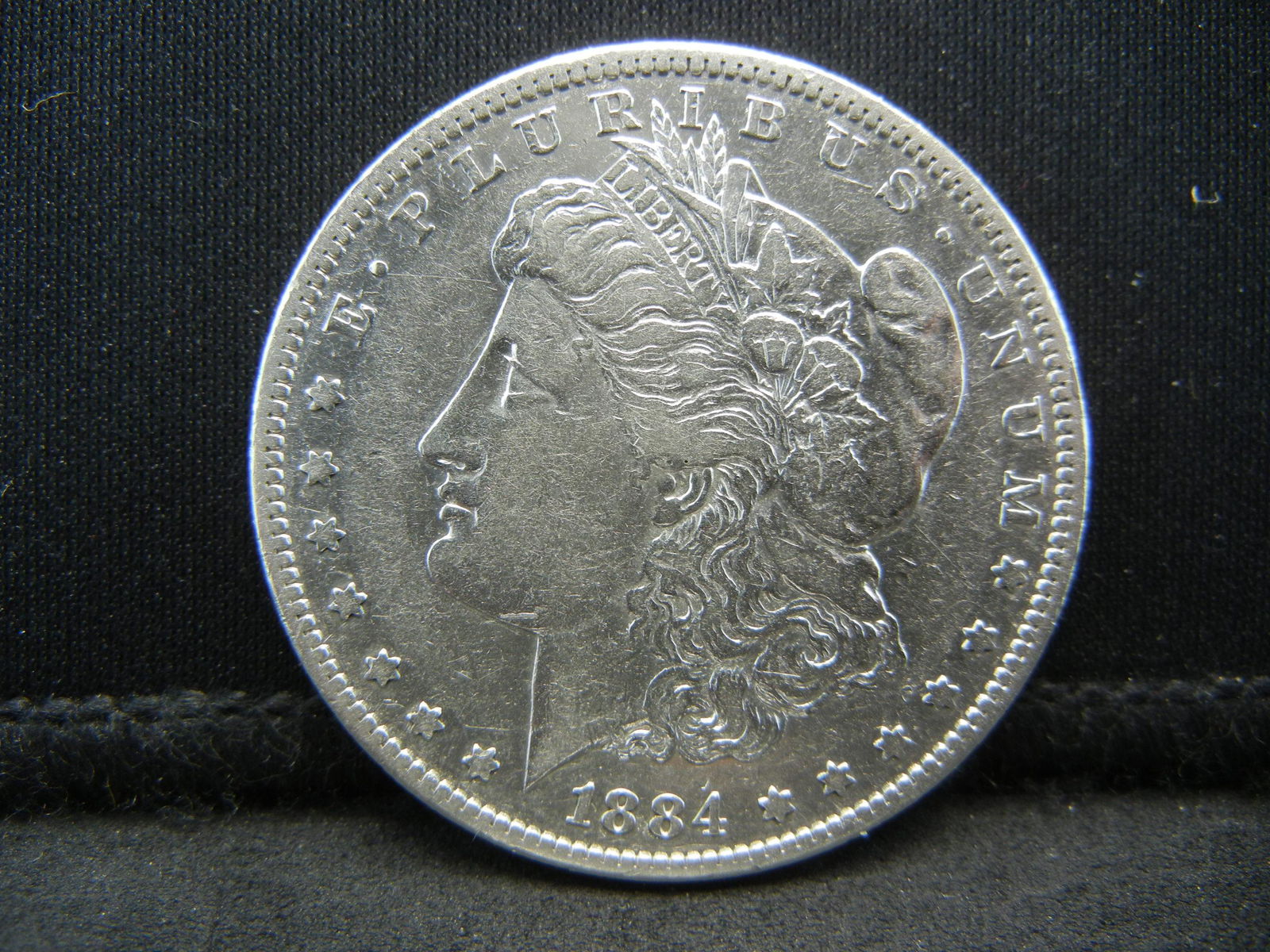1884 S Morgan Dollar AU (1 of 2)