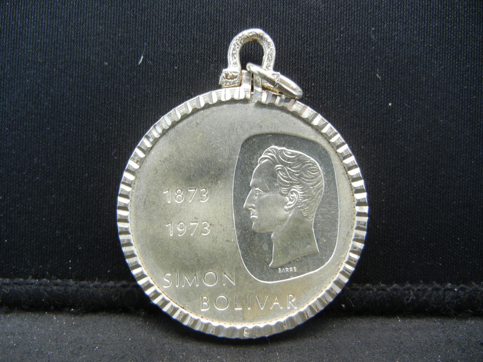 1973 Venezuela 10 Bolivares (silver dollar sized) in (1 of 2)