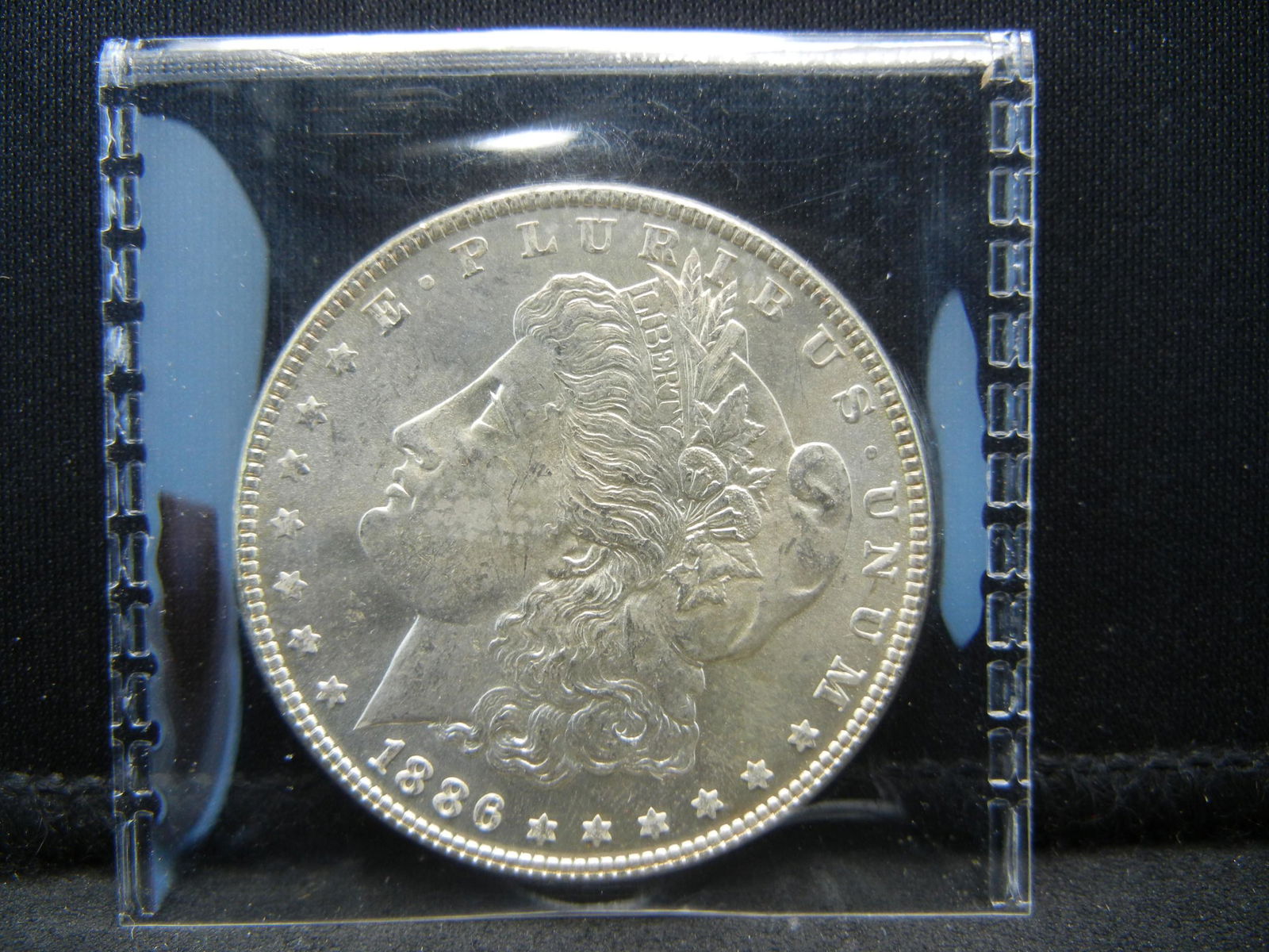 1886 Morgan Dollar Uncirculated (1 of 3)