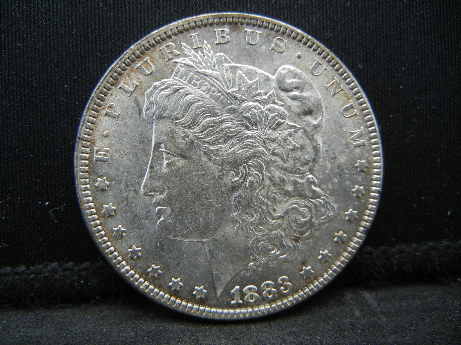1883 Morgan Dollar Higher Grade (1 of 2)