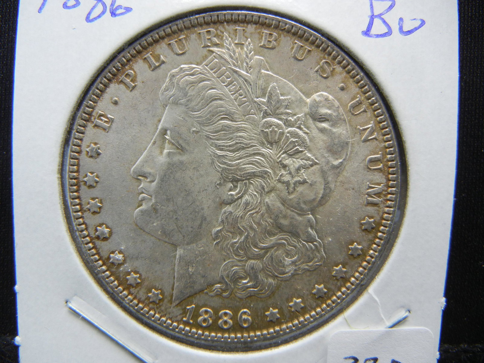 1886 Morgan Dollar.  Brilliant Uncirculated. (1 of 3)