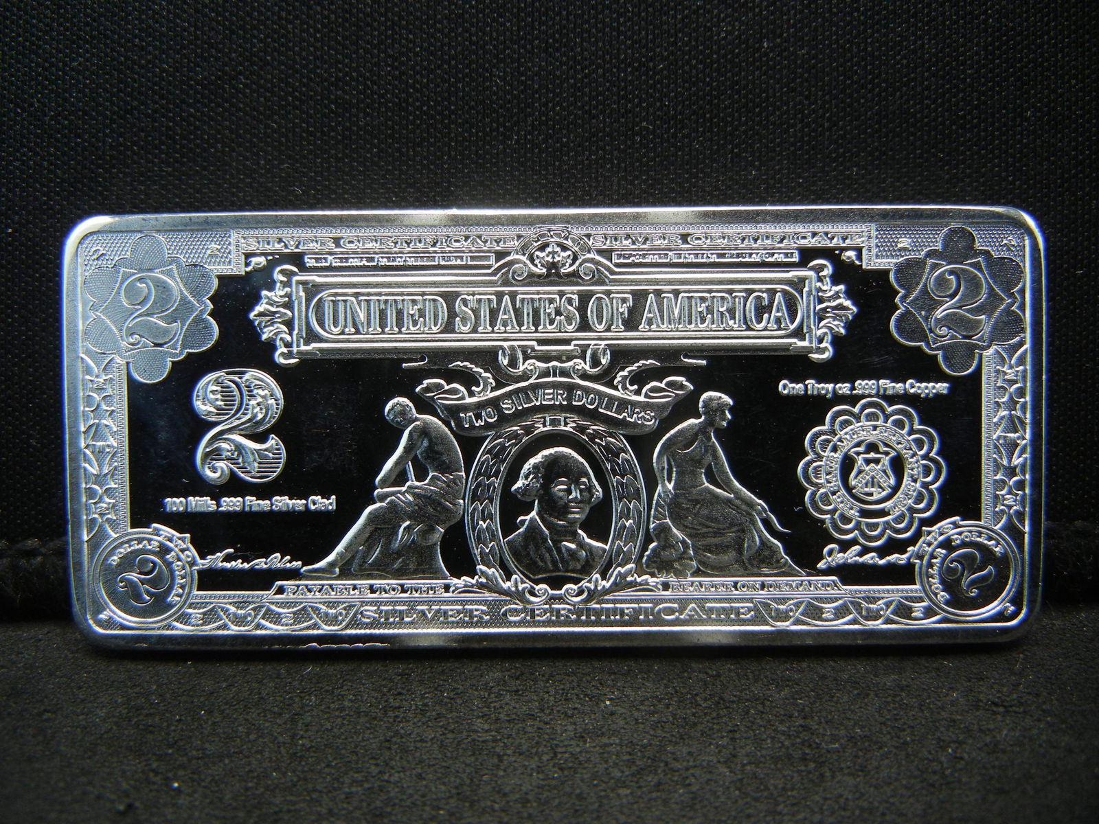 Clad 100 Mills .999Fine Silver Clad, 1.04 Oz. 2 Dollar (1 of 2)