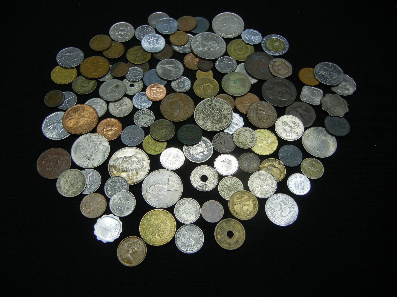 One pound foreign coins. (1 of 5)