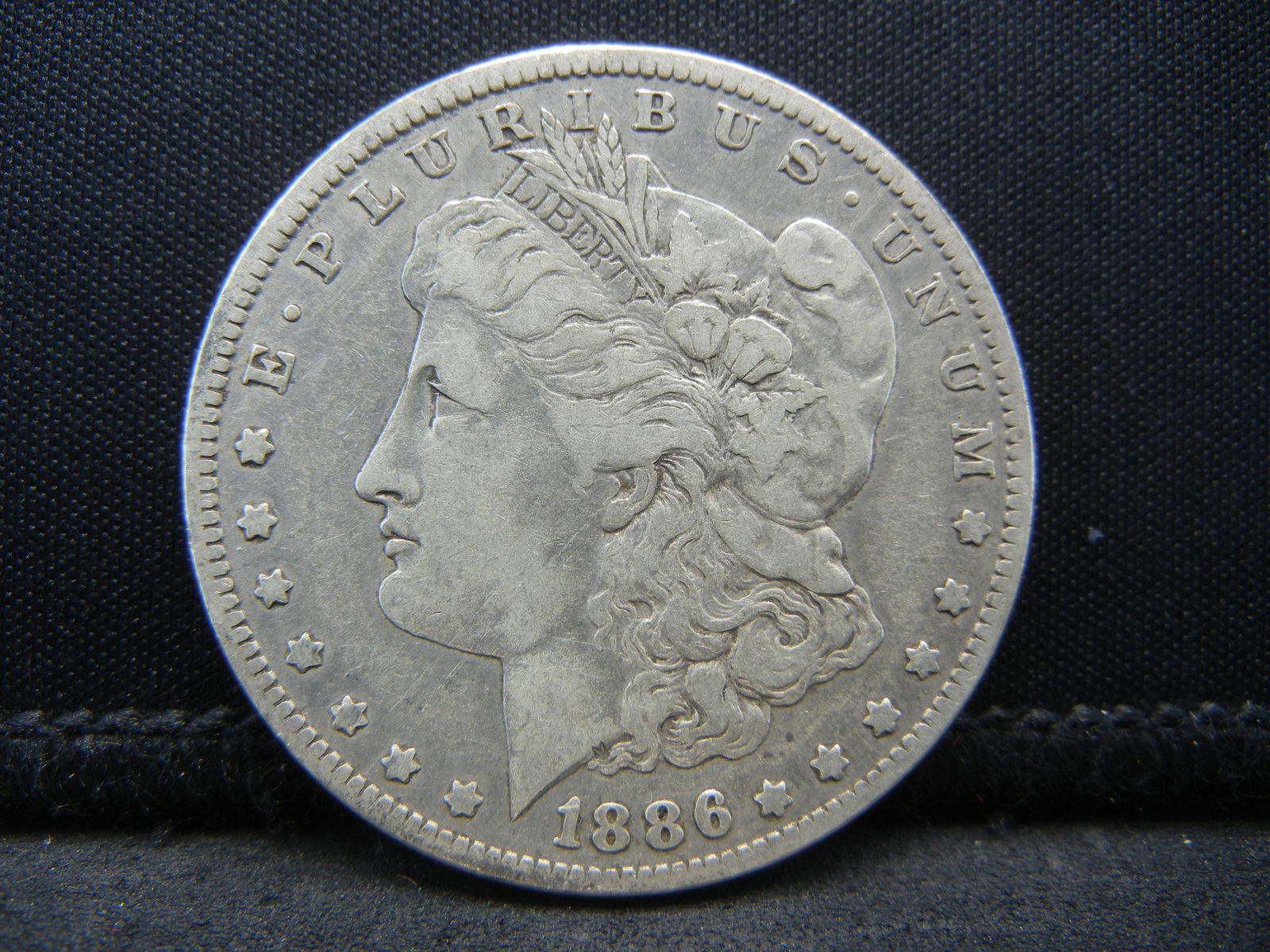 1886 O Morgan Dollar better Date (1 of 2)