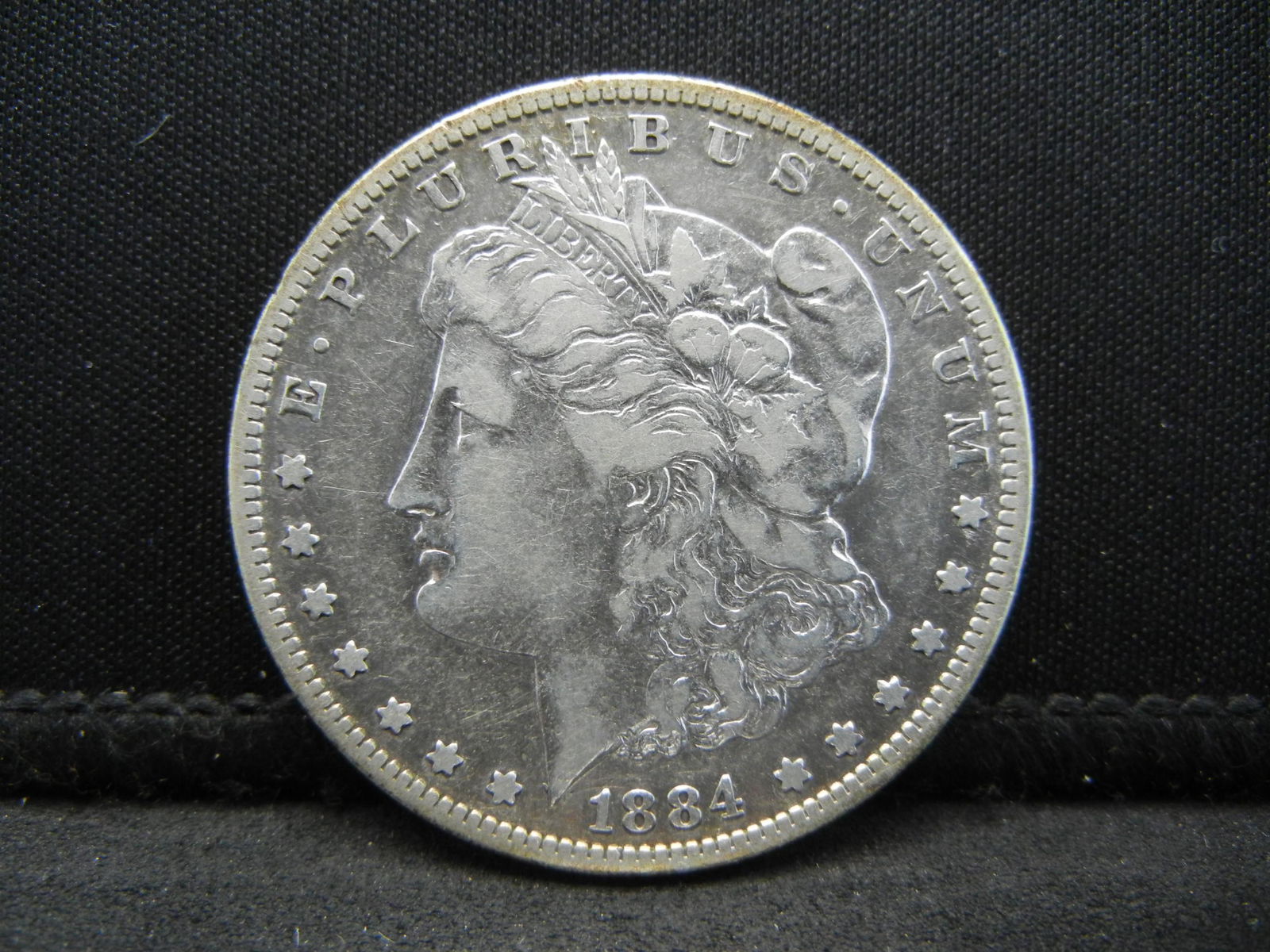 1884 S Morgan Dollar Stronger Details better Date (1 of 2)