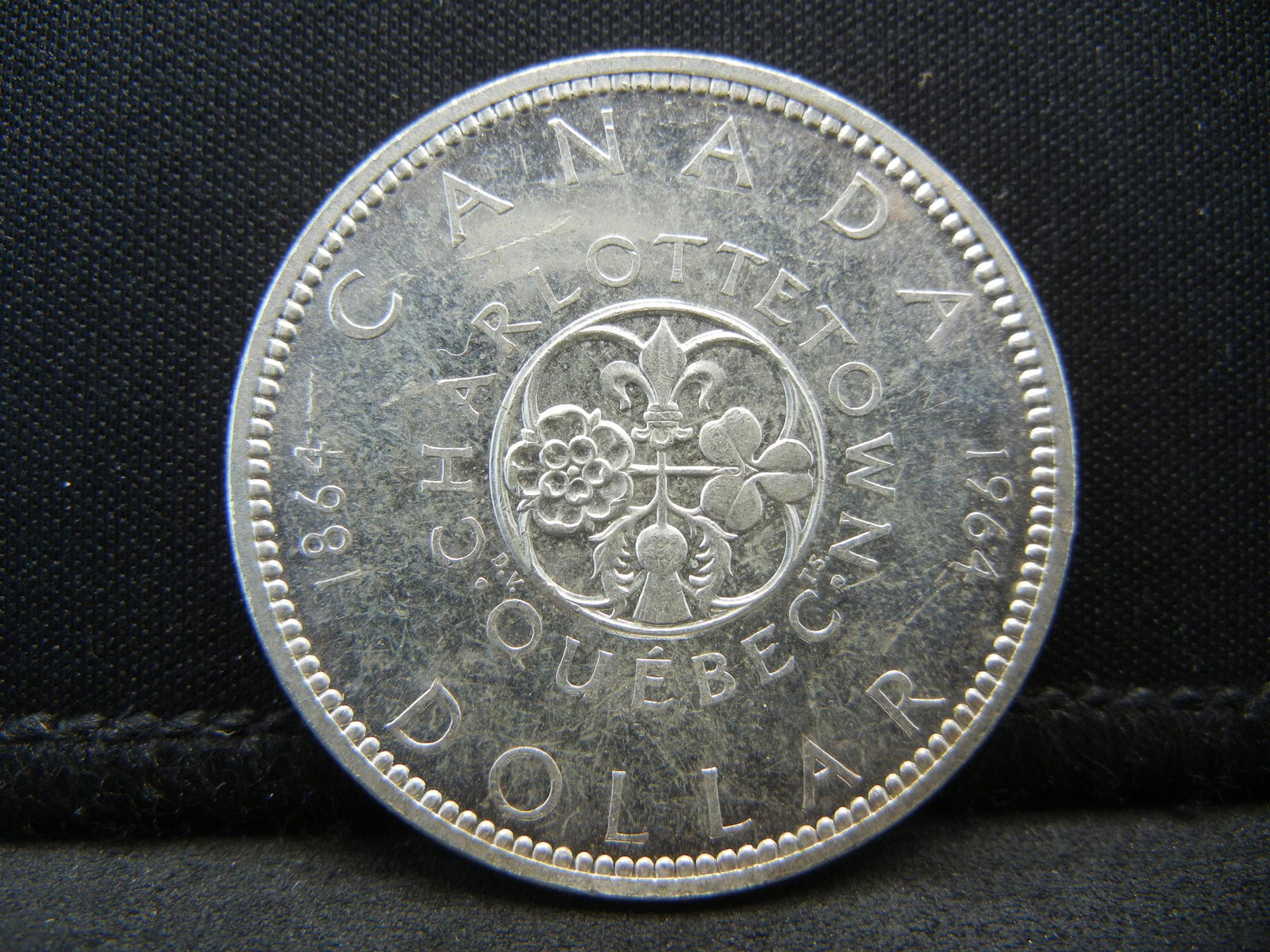 Uncirculated 1964 Silver Canada Dollar (1 of 2)