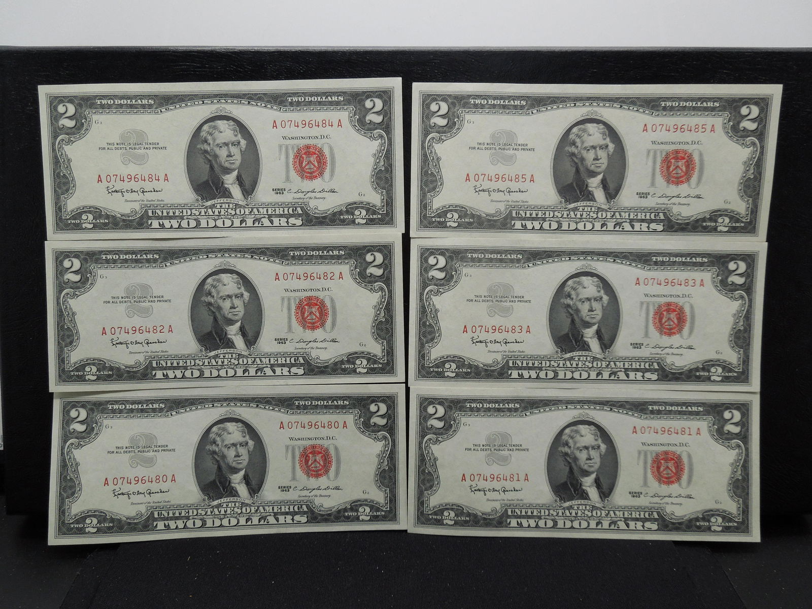 (6) 1963 $2 Red Seals with consecutive serial numbers. (1 of 10)