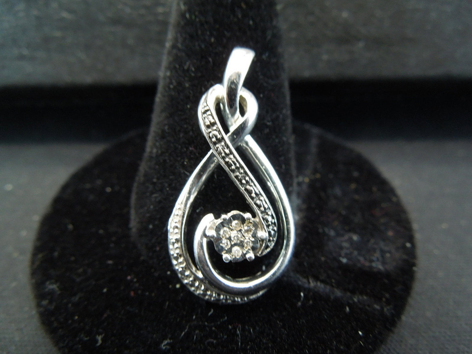 Sterling treble clef pendant with diamonds and black: Sterling treble clef pendant with diamonds and black diamonds. Tested. Attractive and originally very expensive. New