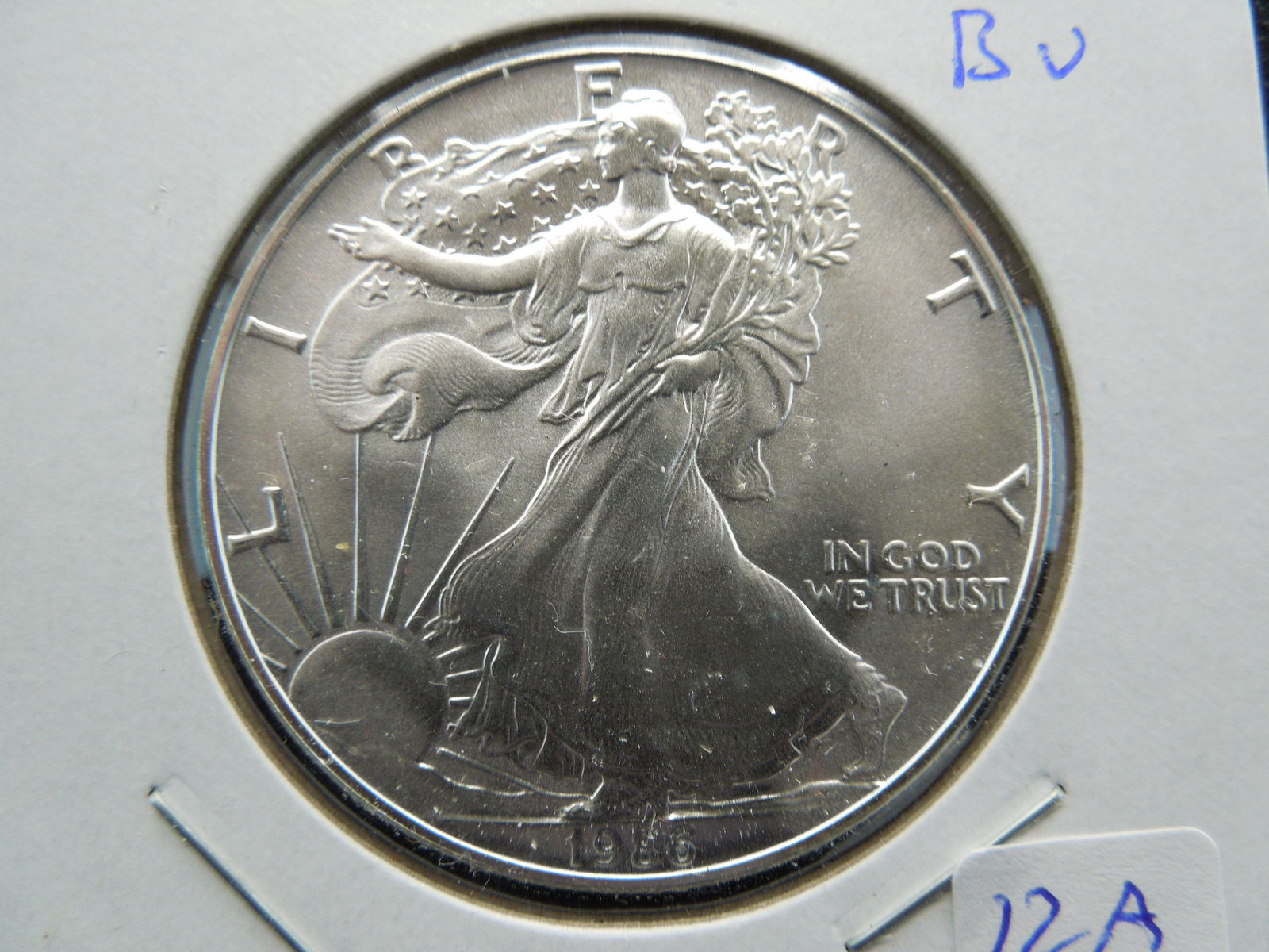 1986 American Silver Eagle.  Tough first year.  GEM (1 of 3)