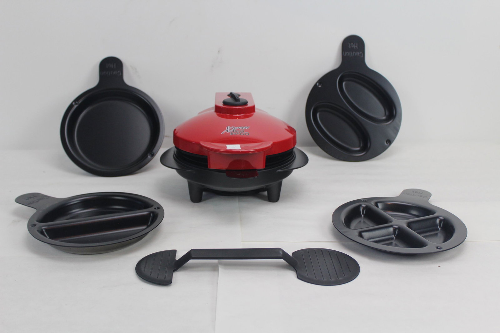New Xpress Ready-Set-Go Sandwich Maker: YES WE WILL SHIP THIS ITEM! Please read all the terms and Conditions of our auction! Please keep in mind, all items we sell are in used Condition unless otherwise stated. Expect some wear, scratches, 