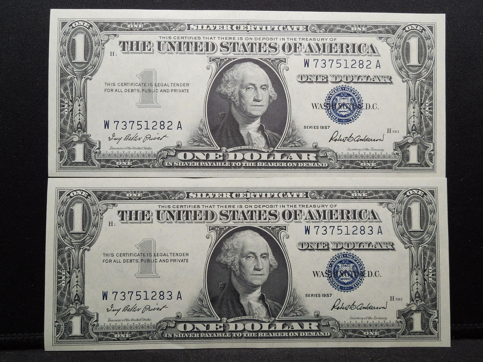 (2) 1957 $1 Silver Certificates.  Consecutive serial (1 of 4)